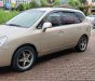 Kia Carens 2.0 MT 2009 - Cần bán Kia Carens 2.0 MT 2009, màu vàng