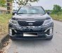 Kia Sorento 2.4L  GAT 2016 - Chính chủ cần tiền bán xe Kia Sorento 2.4L bản GAT sản xuất 2016, màu đen