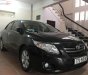 Toyota Corolla altis 2009 - Bán Toyota Corolla Altis sản xuất 2009, màu đen đã đi 80.600km