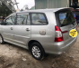 Toyota Innova 2.0E 2014 - Bán Toyota Innova năm 2014 màu bạc, giá tốt 595tr hỗ trợ 100% phí trước bạ