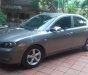 Mazda 3 1.6 MT 2004 - Bán ô tô Mazda 3 1.6 MT sản xuất năm 2004, màu xám số sàn