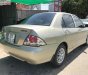 Mitsubishi Galant 1.5 2003 - Bán lại xe Mitsubishi Galant 1.5 2003, màu vàng cát