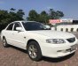 Mazda 626 2001 - Cần bán xe Mazda 626 sản xuất năm 2001, màu trắng xe gia đình, 125tr