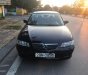 Mazda 626 2001 - Cần bán lại xe Mazda 626 2001, màu đen, xe gia đình