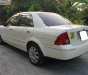 Ford Laser GHIA 1.8 AT 2003 - Bán Ford Laser GHIA 1.8 AT 2003, màu trắng, xe gia đình