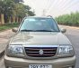 Suzuki Grand vitara  AT 2003 - Cần bán lại xe Suzuki Grand vitara AT năm 2003, màu vàng số tự động