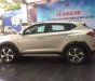 Hyundai Tucson  2.0AT 2018 - Bán ô tô Hyundai Tucson đời 2018, màu vàng giá tốt