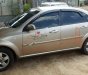 Daewoo Lacetti EX 2011 - Gia đình bán Daewoo Lacetti EX đời 2011, màu vàng