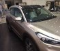 Hyundai Tucson  2.0AT 2018 - Bán ô tô Hyundai Tucson đời 2018, màu vàng giá tốt