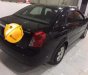 Daewoo Lacetti EX 2011 - Bán xe Daewoo Lacetti EX đời 2011, màu đen số sàn  