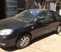 Toyota Corolla altis 2003 - Cần bán gấp Toyota Corolla Altis sản xuất 2003 màu đen, giá 282 triệu