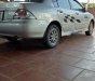 Mitsubishi Lancer 2004 - Cần bán xe cũ Mitsubishi Lancer năm sản xuất 2004, màu bạc xe gia đình