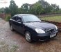 Daewoo Nubira 2002 - Cần bán gấp Daewoo Nubira 2002, màu đen, 75tr