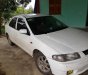 Mazda 323 GLXi 1.6 MT 2000 - Cần bán Mazda 323 GLXi 1.6 MT năm 2000, màu trắng, nhập khẩu chính chủ 