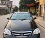 Daewoo Lacetti EX 2010 - Bán xe Daewoo Lacetti EX sản xuất 2010, màu đen xe gia đình, giá chỉ 235 triệu