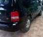 Kia Carnival GS 2.5 MT 2006 - Bán Kia Carnival GS 2.5 MT sản xuất 2006, màu đen, xe gia đình