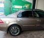 Ford Mondeo 2004 - Cần bán lại xe Ford Mondeo 2004, màu nâu