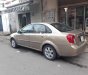 Daewoo Lacetti 2005 - Cần bán lại xe Daewoo Lacetti sản xuất năm 2005, màu vàng, giá tốt