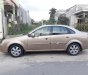 Daewoo Lacetti 2005 - Cần bán lại xe Daewoo Lacetti sản xuất năm 2005, màu vàng, giá tốt