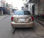 Daewoo Lacetti 2005 - Cần bán lại xe Daewoo Lacetti sản xuất năm 2005, màu vàng, giá tốt