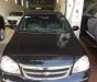 Chevrolet Lacetti 1.6 MT 2014 - Cần bán xe Chevrolet Lacetti 1.6 MT đời 2014, màu đen  