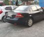 Ford Mondeo 2004 - Cần bán Ford Mondeo đời 2004, màu đen, giá chỉ 190 triệu