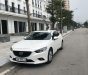 Mazda 6 2.0 AT 2014 - Cần bán lại xe Mazda 6 2.0 AT năm sản xuất 2014, màu trắng, nhập khẩu