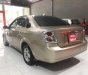 Daewoo Lacetti EX 2011 - Cần bán lại xe Daewoo Lacetti EX đời 2011, màu vàng cát