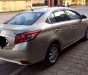 Toyota Vios 2014 - Chính chủ bán lại xe Toyota Vios đời 2014, màu vàng cát