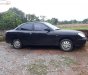 Daewoo Nubira 1.6 2002 - Cần bán gấp Daewoo Nubira 1.6 đời 2002, màu đen, giá tốt