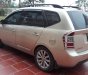 Kia Carens EX 2011 - Gia đình cần bán Kia Carens đời 2011, bản đủ, máy 2.0,cửa nóc, màu vàng cát