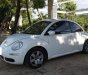 Volkswagen Beetle   1.6AT 2009 - Cần bán gấp Volkswagen Beetle 1.6AT năm 2009, màu trắng, nhập khẩu nguyên chiếc, 520tr