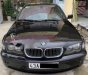 BMW 3 Series 318i 2.0 2005 - Bán xe BMW 3 Series 318i 2.0 năm 2005, màu đen chính chủ, giá chỉ 260 triệu