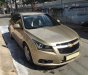 Chevrolet Cruze LS 2013 - Bán nhanh Chevrolet Cruze LS 2013 số sàn vàng cát chất zin