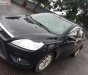 Ford Focus 1.8MT 2010 - Cần bán gấp Ford Focus 1.8MT đời 2010, màu đen xe gia đình