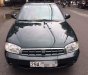 Kia Spectra LS 2004 - Cần bán gấp Kia Spectra LS 2004, màu đen, xe nhập, số sàn