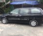 Kia Carnival GS 2.5 AT 2009 - Cần bán lại xe Kia Carnival GS 2.5 AT 2009, màu đen  