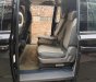 Kia Carnival 2.7 MT 2010 - Bán Kia Carnival 2.7 MT năm 2010, màu đen, nhập khẩu nguyên chiếc  