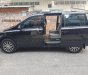 Kia Carnival 2.7 MT 2010 - Bán Kia Carnival 2.7 MT năm 2010, màu đen, nhập khẩu nguyên chiếc  