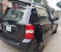 Kia Carnival 2.7 MT 2010 - Bán Kia Carnival 2.7 MT năm 2010, màu đen, nhập khẩu nguyên chiếc  