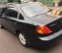 Kia Spectra 1.6 MT 2004 - Cần bán xe Kia Spectra 1.6 MT đời 2004, màu xanh lam như mới