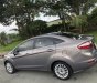 Ford Fiesta 2014 - Bán gấp xe gia đình Ford Titanium AT 1.5 sản xuất 2014 xám titan