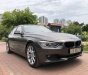 BMW 3 Series  320i  2014 - Bán BMW 3 Series 320i sản xuất 2014, màu nâu, xe nhập