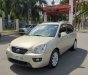 Kia Carens EX 2.0 MT 2012 - Cần bán Kia Carens EX 2.0 AT 2012, màu vàng đồng, nhập khẩu, còn rất mới