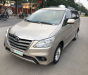 Toyota Innova E 2014 - Cần bán Toyota Innova E sản xuất năm 2014, màu vàng