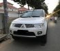 Mitsubishi Pajero Sport 2013 - Cần bán Mitsubishi Pajero Sport năm 2013, màu trắng đã đi 100.000km