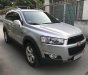 Chevrolet Captiva LT 2014 - Cần bán xe Chevrolet Captiva 2014 LT số sàn màu bạc