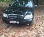 Kia Carnival 2005 - Bán ô tô Kia Carnival năm 2005, màu đen, giá tốt