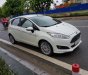 Ford Fiesta 1.5AT 2016 - Cho ra đi em Ford Fiesta 1.5AT 2016 màu trắng, 5 cửa, đẹp hoàn hảo