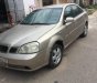 Daewoo Lacetti 1.6 2005 - Cần bán lại xe Daewoo Lacetti 1.6 đời 2005, màu vàng